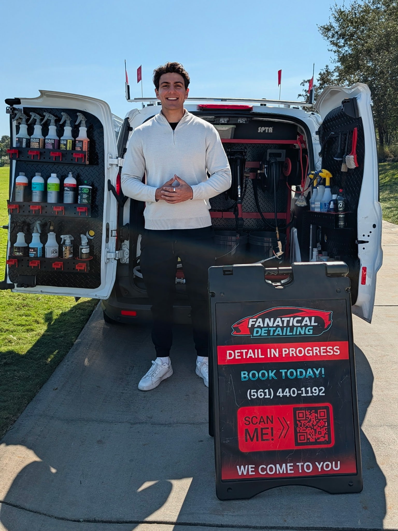 Founder standing in front of detailing van